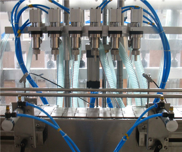 Unom nga Ulo ang awtomatikong pagpuno sa makina nga likido